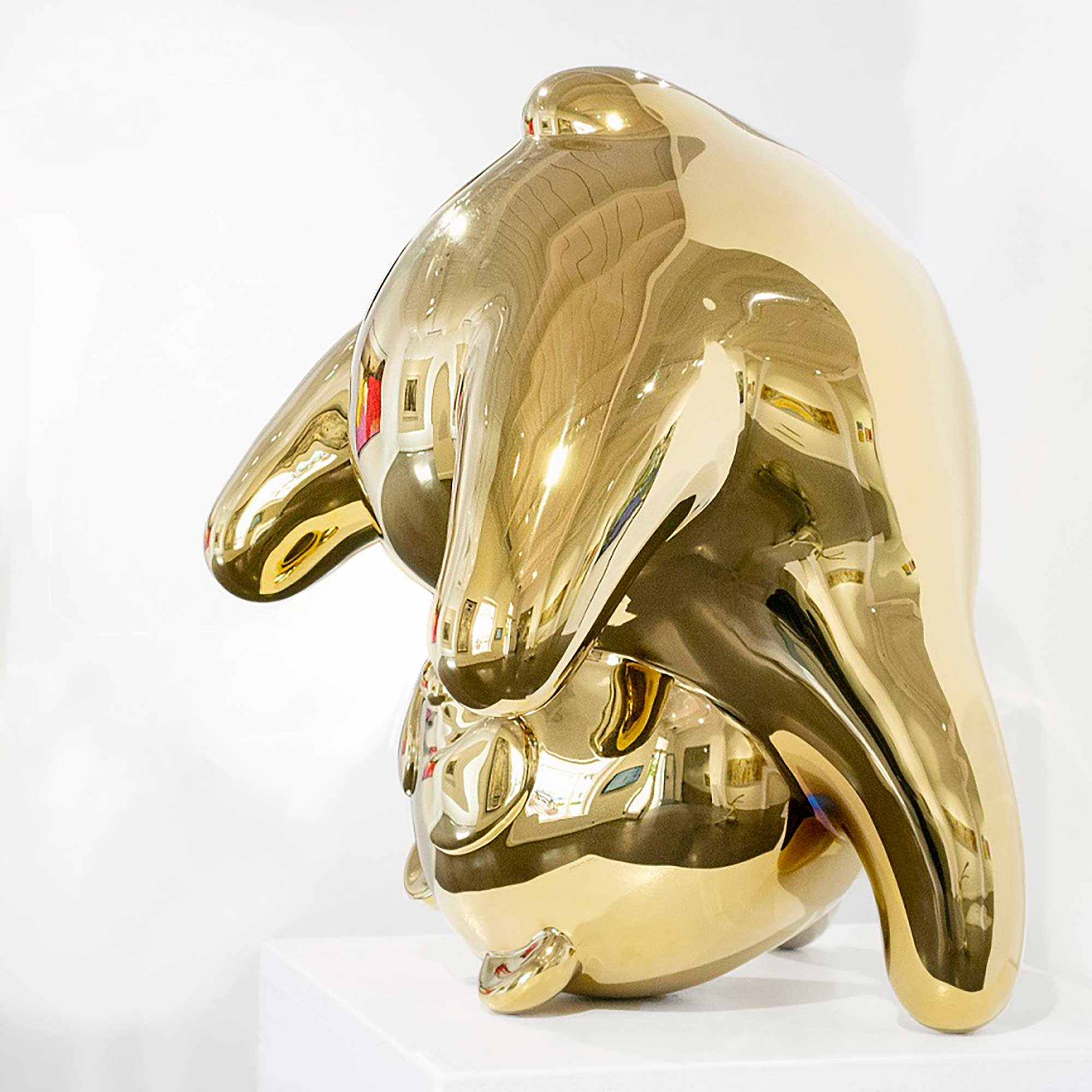Panda-monium, gold coated Mirror Polished Stainless Steel Sculpture, by artist Ferdi B Dick, side view