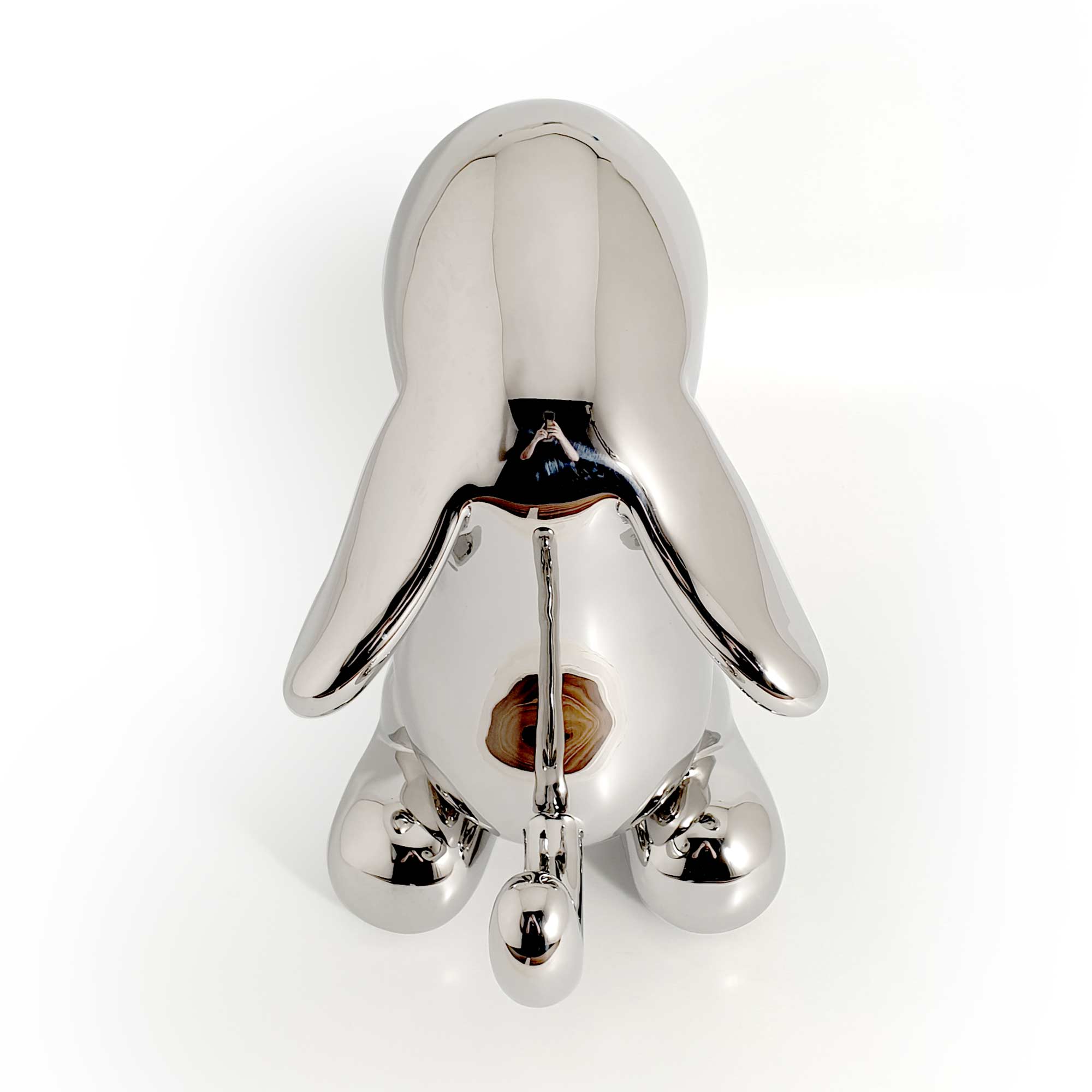 The beggar, dog sculpture, Mirror Polished Stainless Steel Sculpture, by artist Ferdi B Dick, back top view