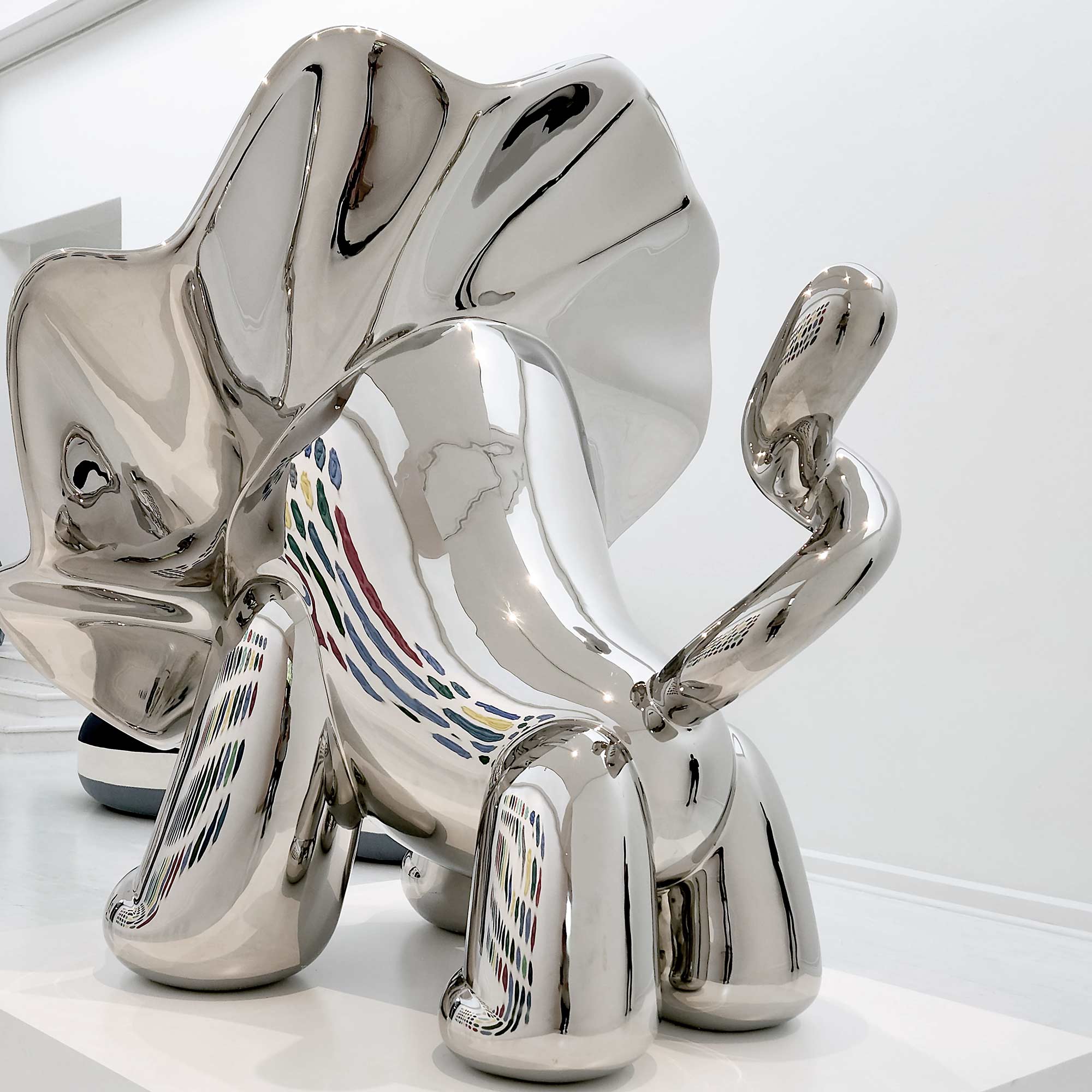 Lions breath polished stainless steel sculpture large size by Ferdi B Dick , tail view 2