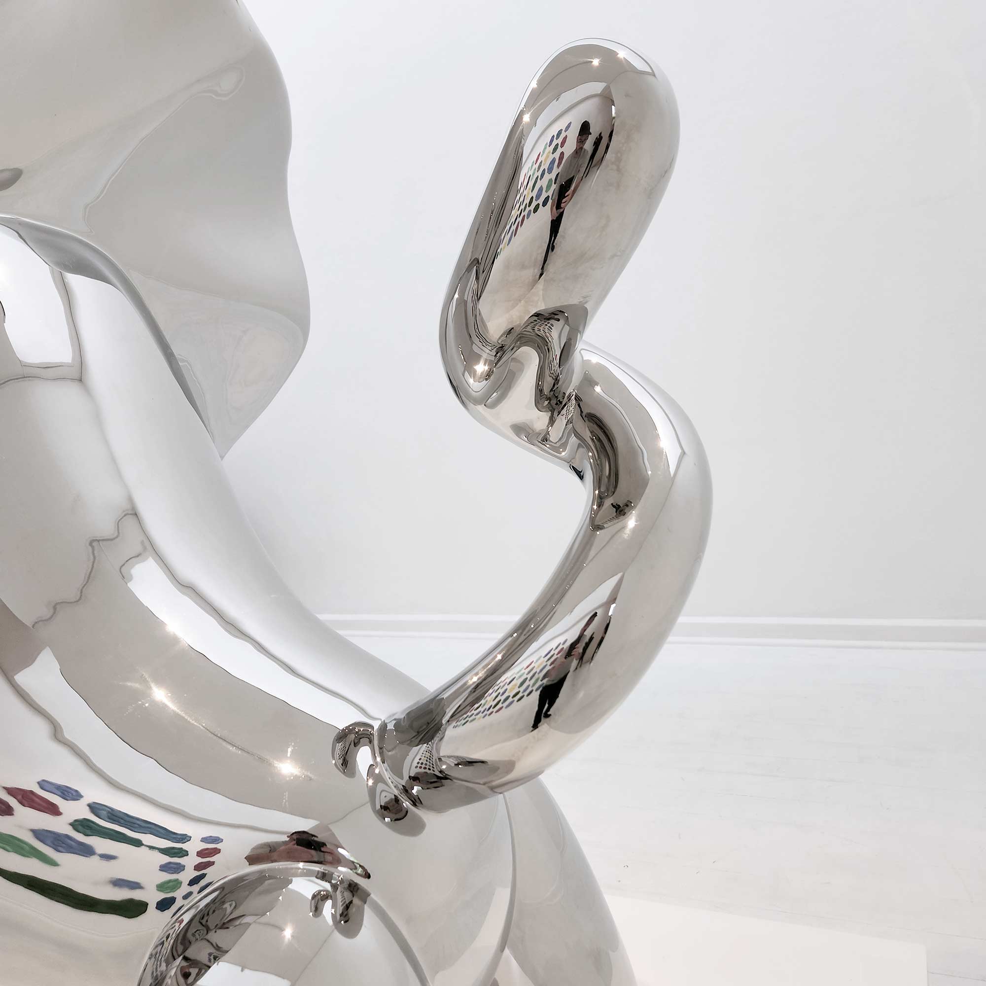 Lions breath polished stainless steel sculpture large size by Ferdi B Dick , tail view 2