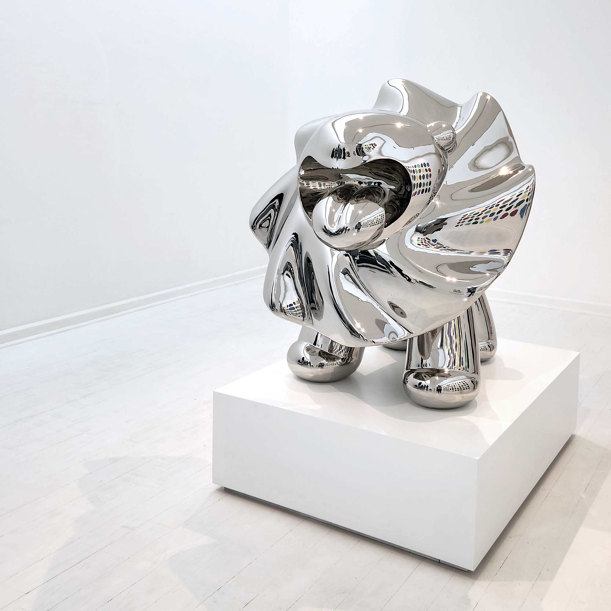 Lions breath polished stainless steel sculpture large size by Ferdi B Dick , wide hero view