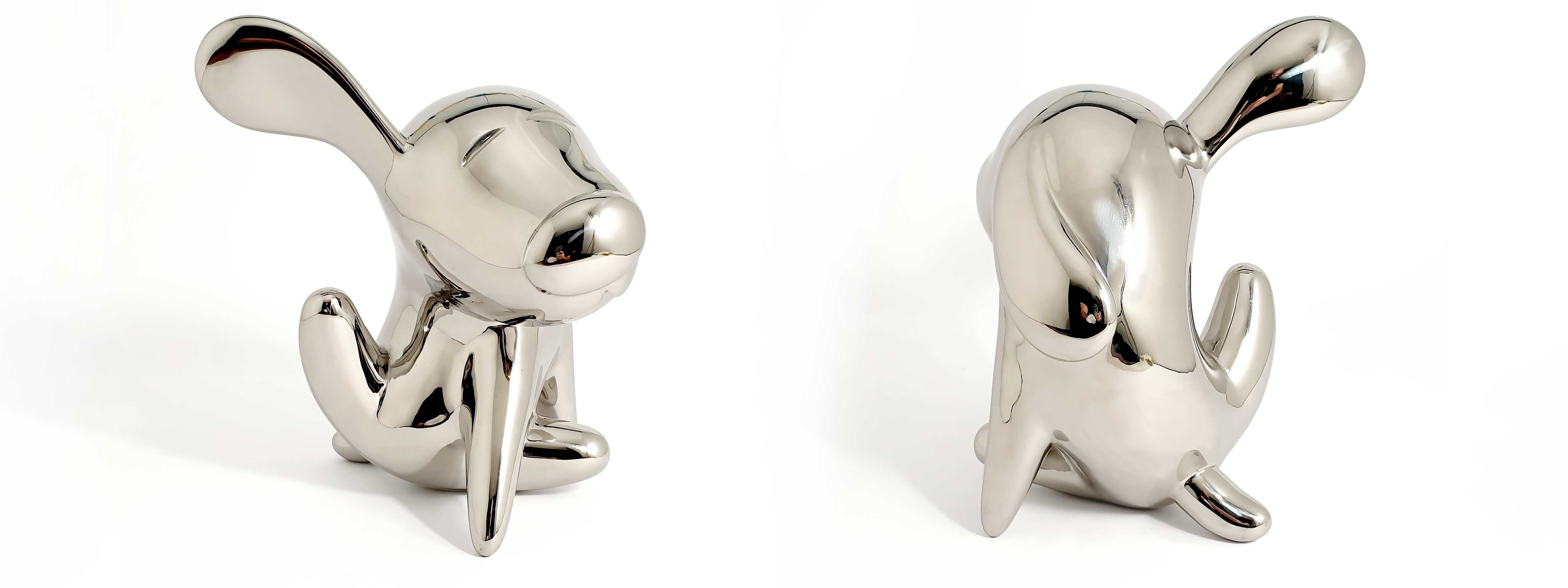 The itch, dog sculpture, Mirror Polished Stainless Steel Sculpture, by artist Ferdi B Dick, banner