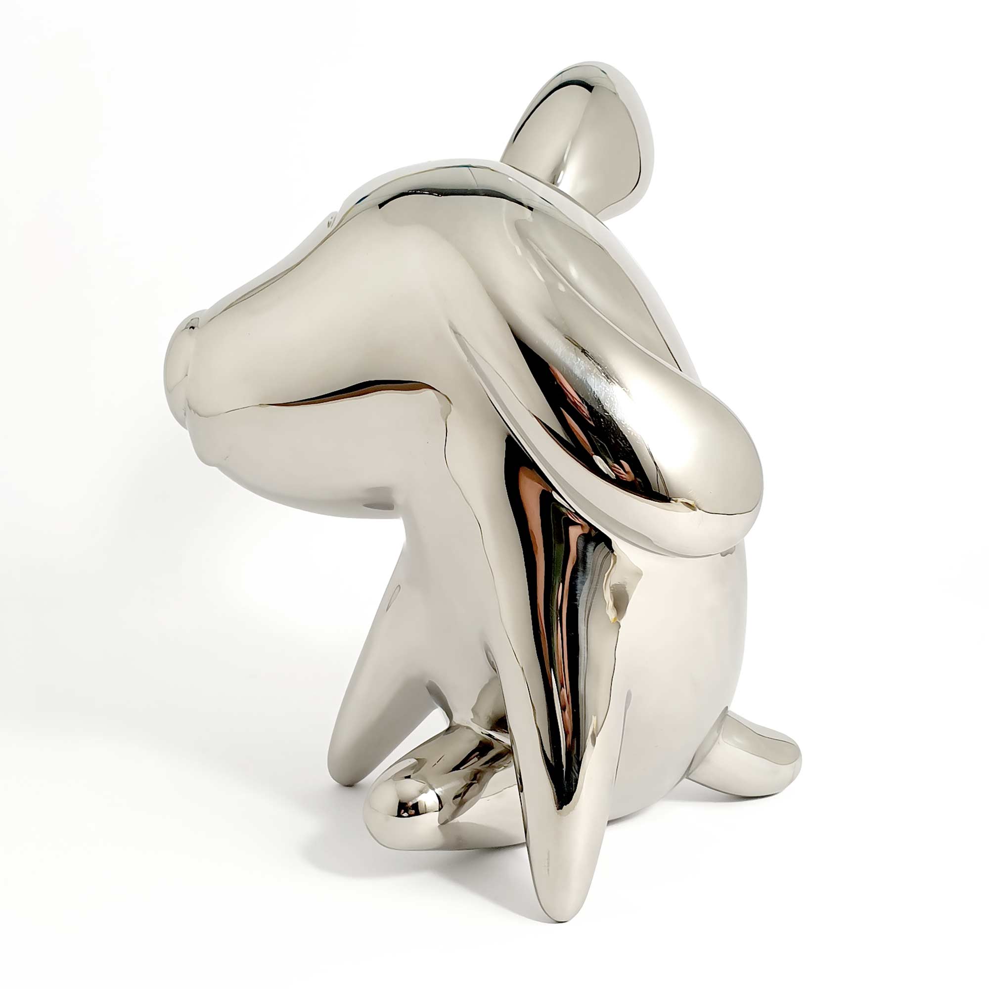 The itch, dog sculpture, Mirror Polished Stainless Steel Sculpture, by artist Ferdi B Dick, side view