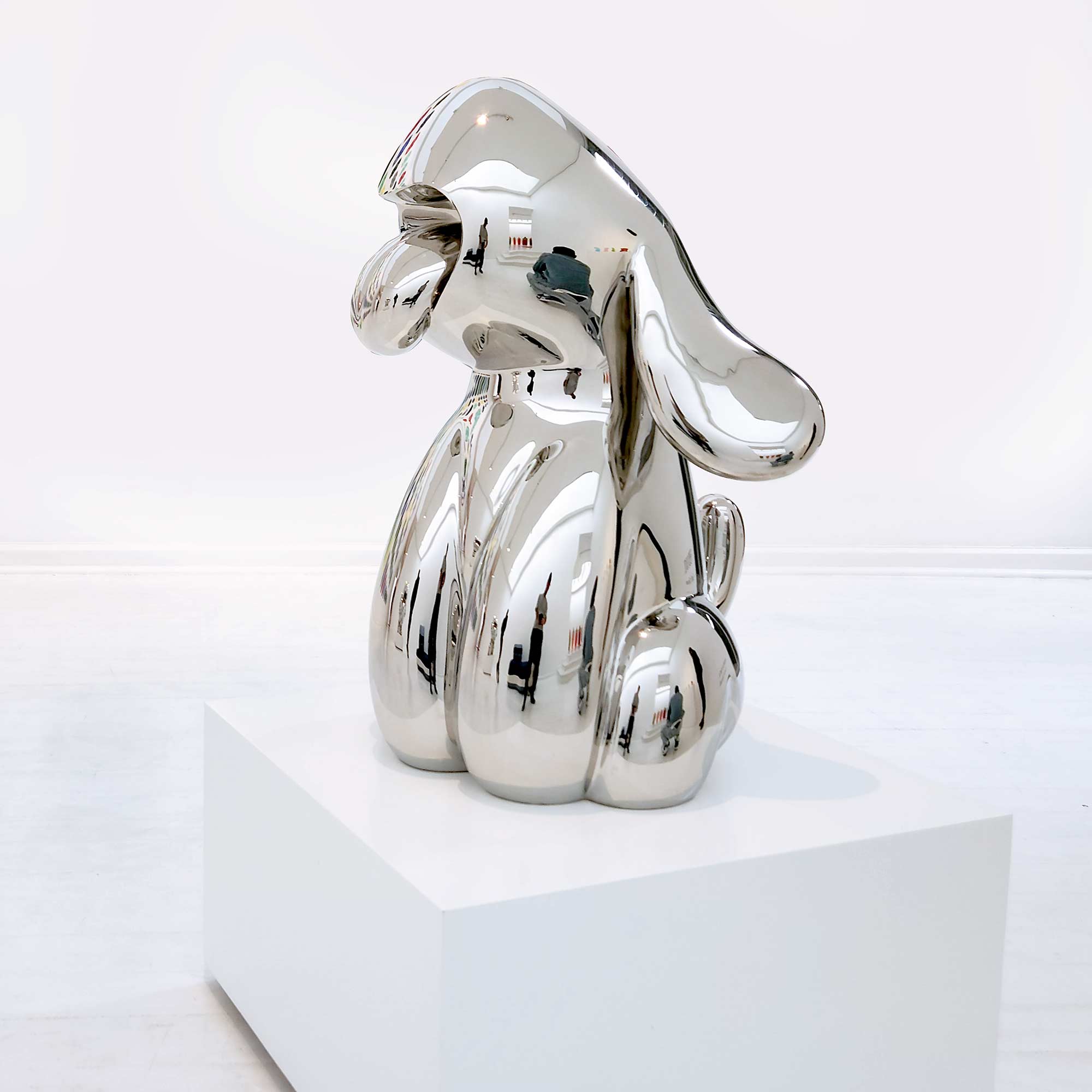 Dog Roar, Polished Stainless steel sculpture, 80 cm high by Ferdi B Dick, side view