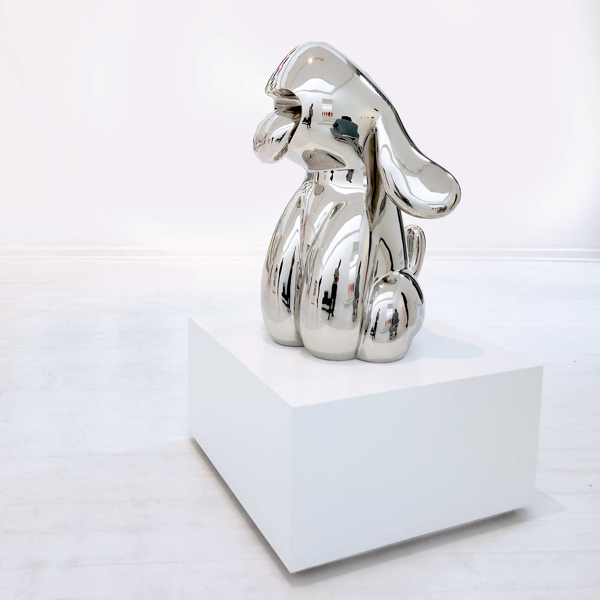 Dog Roar, Polished Stainless steel sculpture, 80 cm high by Ferdi B Dick, side view