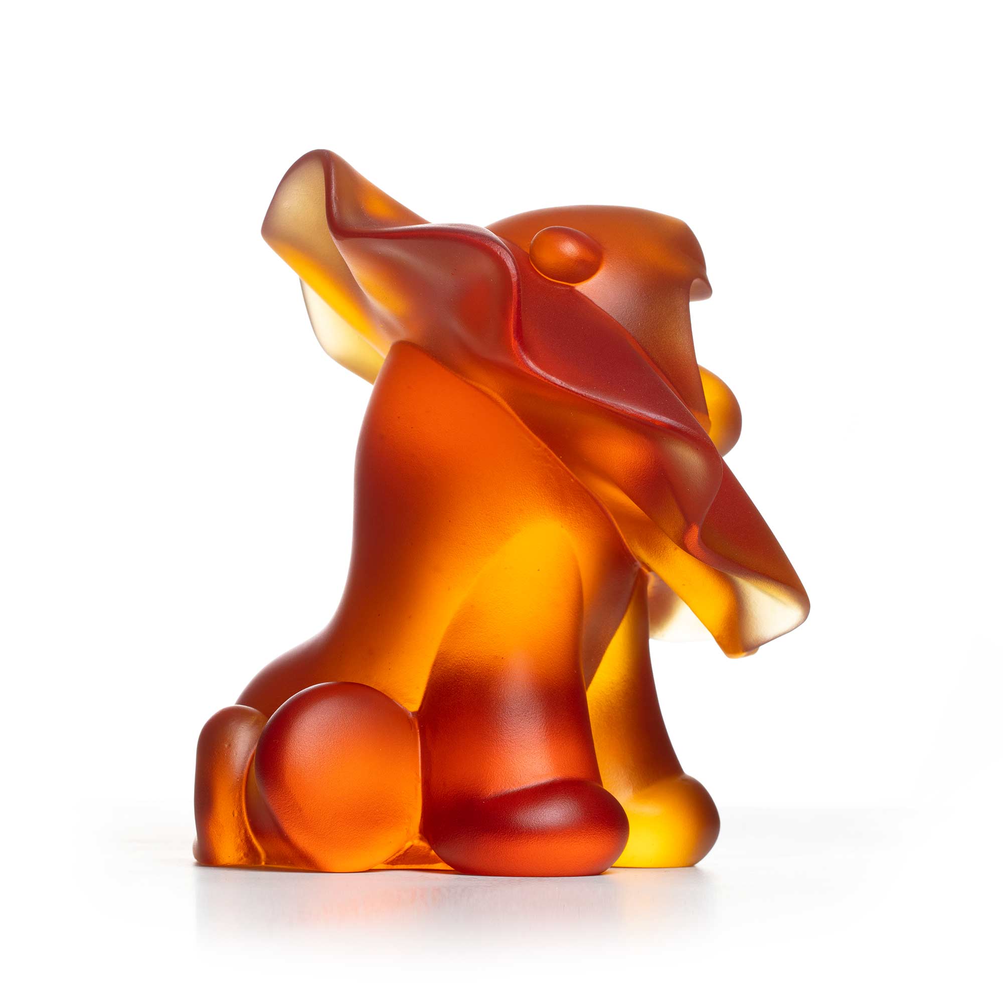 Lion roar, amber crystal sculpture,  15 cm height, by artist Ferdi B Dick, side view