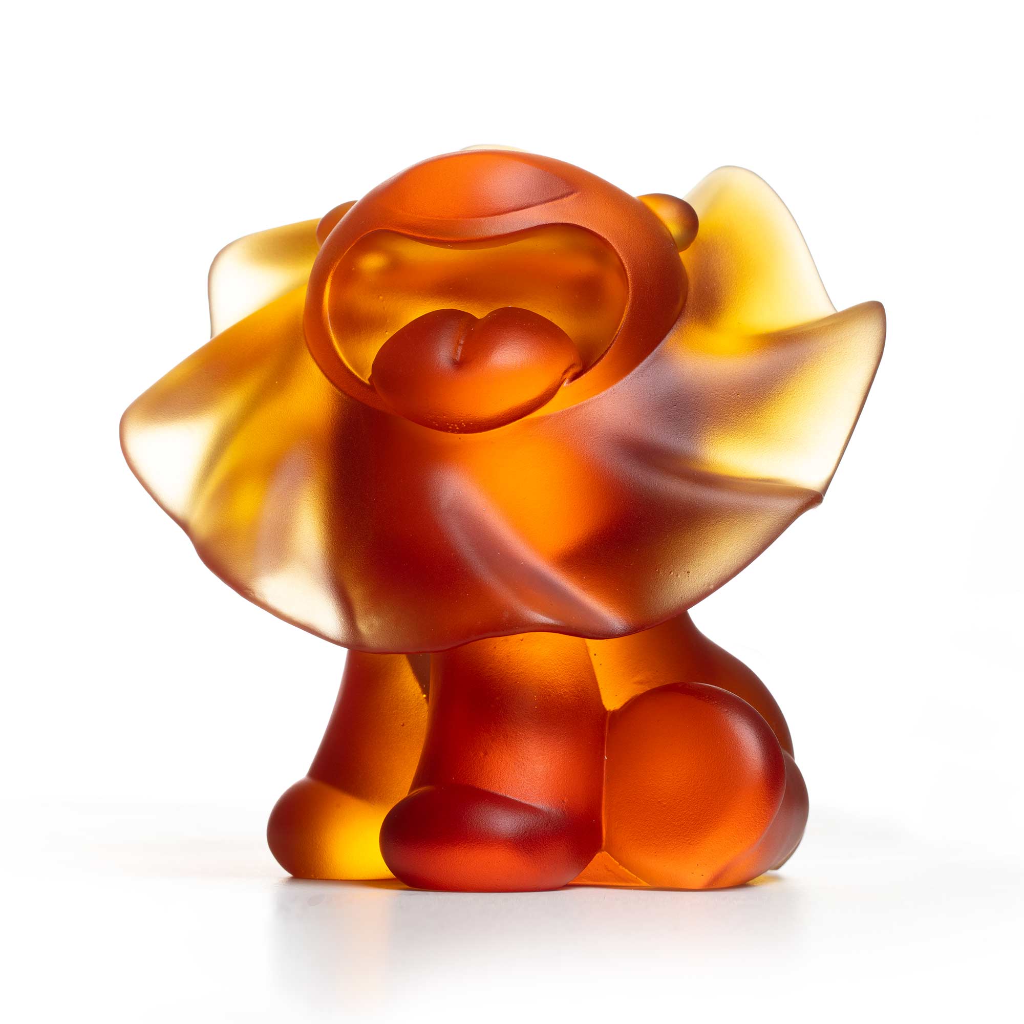 Lion roar, amber crystal sculpture,  15 cm height, by artist Ferdi B Dick, front view