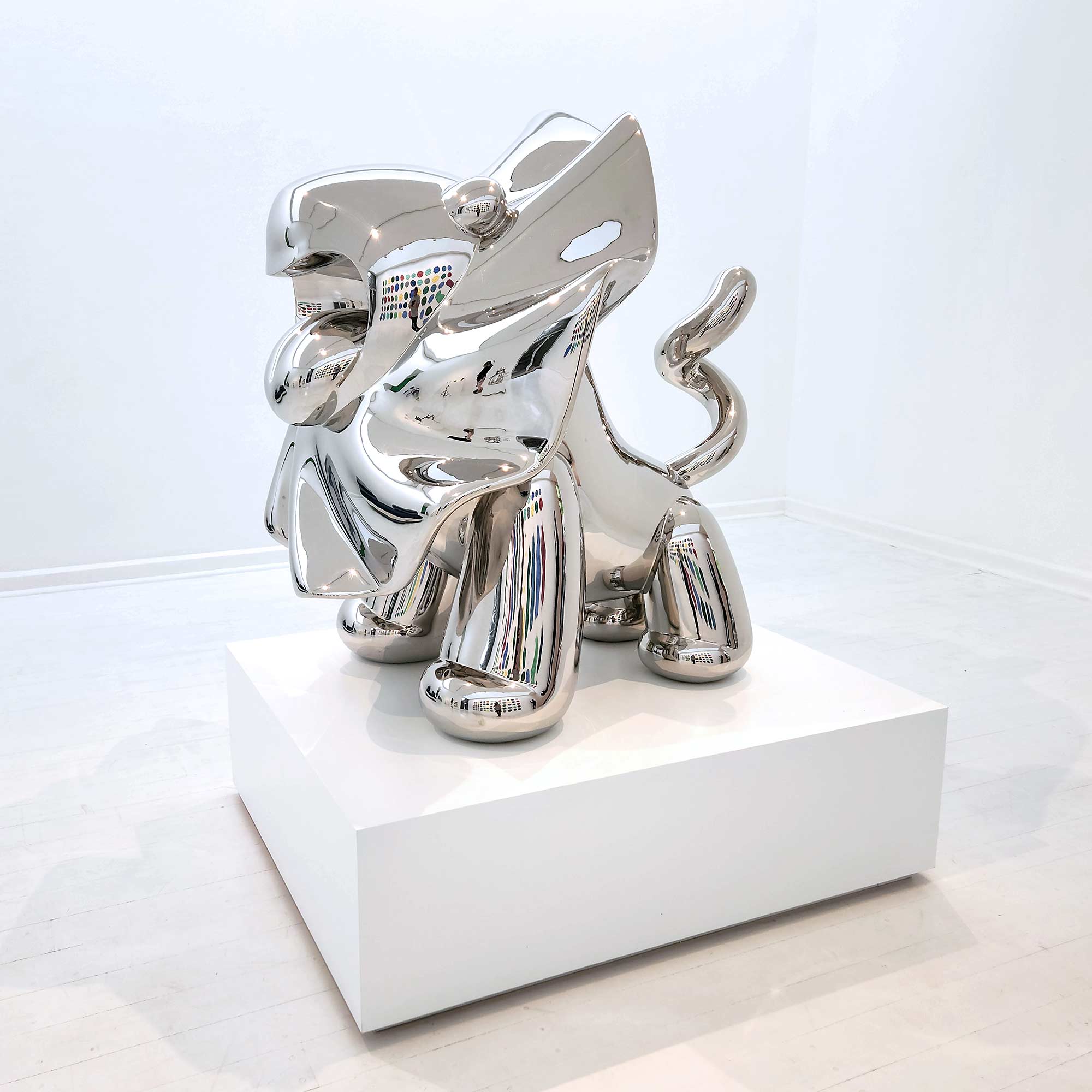 Lions breath polished stainless steel sculpture large size by artist Ferdi B Dick , side view