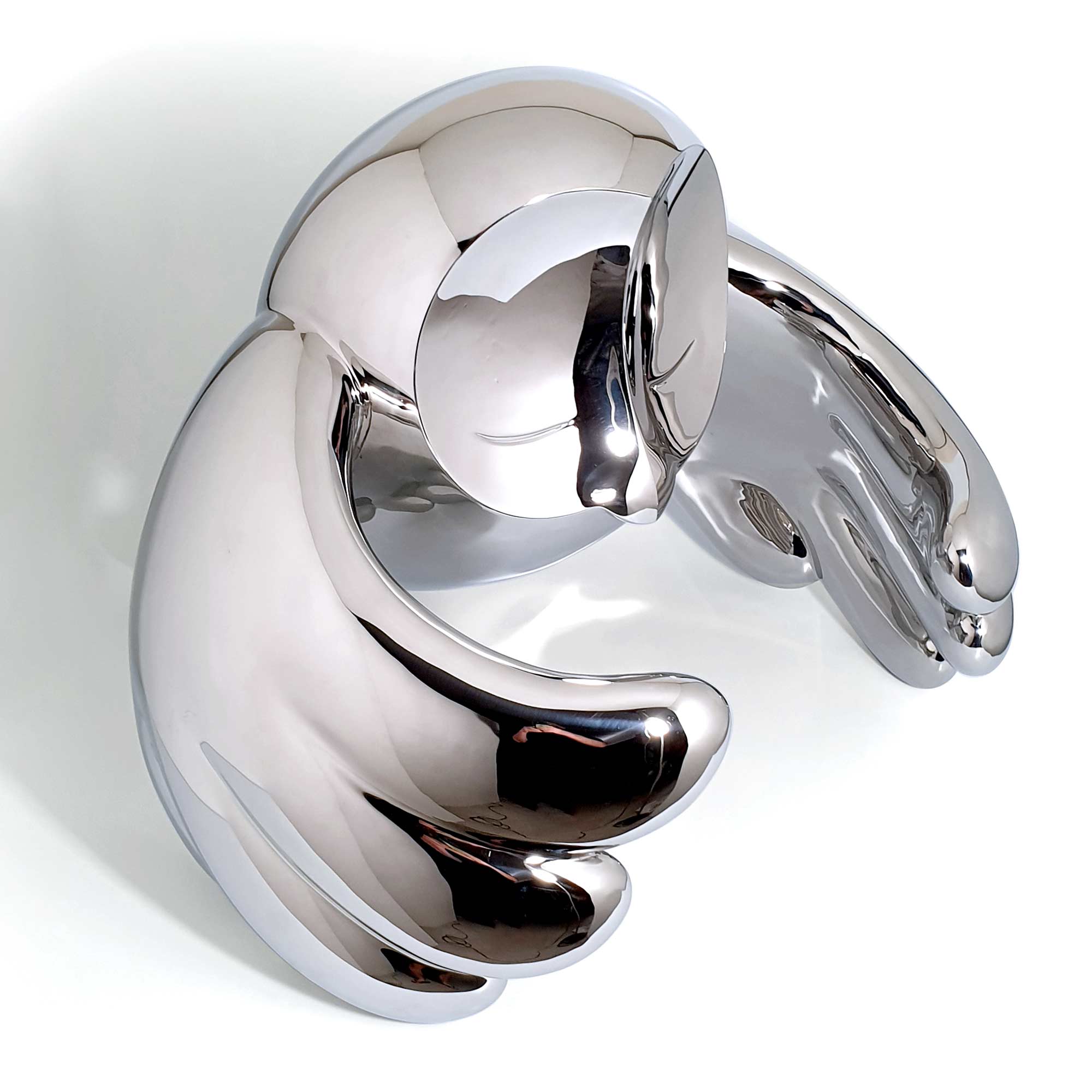 Wind Beneath Owl, bird sculpture, Mirror Polished Stainless Steel Sculpture, by artist Ferdi B Dick, top view